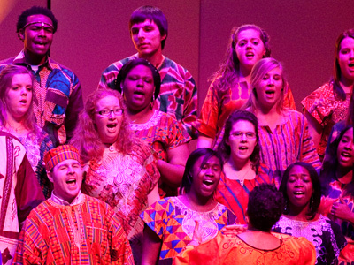 If I was in charge of this event, everybody would be lit with normal white light so they don`t look pink or blue or yellow.