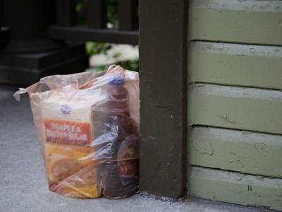 There has been a bag of groceries on my porch for days.  Maybe somebody thinks that I`m hungry for pancakes.