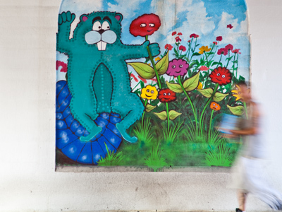 Under the railroad bridge.