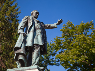 William McKinley backs away slowly from approaching scrap metal dealers.