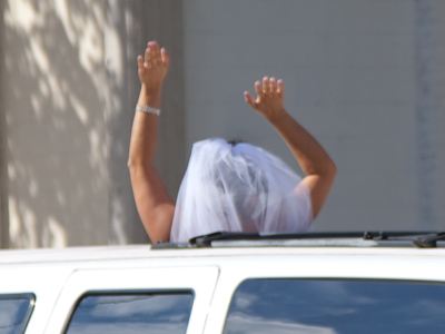 This new bride went past shouting `JUST MARRIED!!`  The groom was presumably inside, sitting in quiet panic.