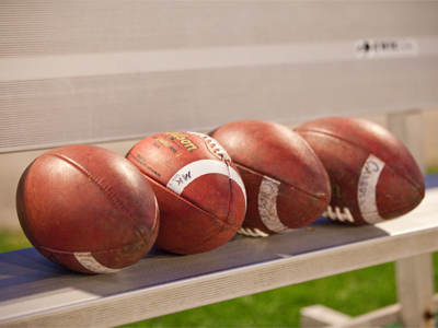 A twisted mind designed the American football.