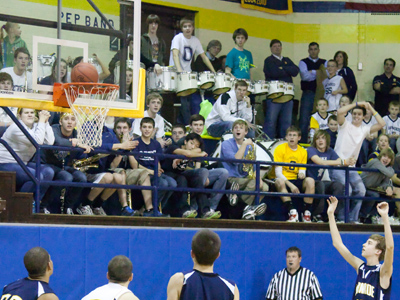 With zero seconds left, Oakwood could`ve tied the game by making two free throws.  The first one swished.  Look at the faces in the crowd as the second shot . . . rattled out.