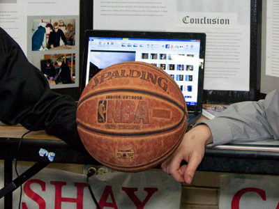 No, forget the robotic lawnmower.  What you really need is a catapult that can make baskets from fifty feet away.