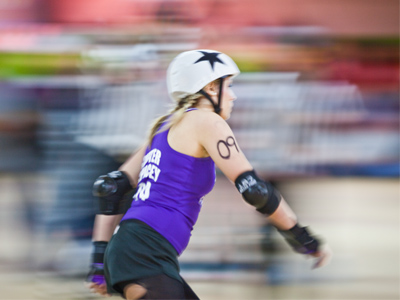 This looks like it was manipulated in Photoshop, but this is what the camera captured.  It`s a fortunate combination of horizontal panning and a burst of flash at the right moment.