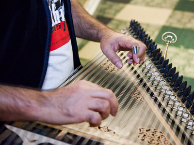 Will work for music.  I gave Hasan some photos of his performance, and he gave me a copy of his latest CD.