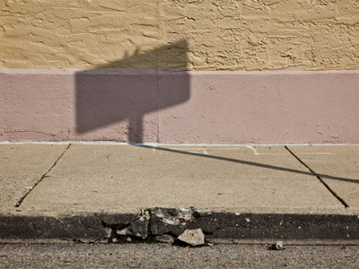 Past the pits where the asphalt flowers grow we shall walk with a walk that is measured and slow, and watch where the chalk-white arrows go to the place where the sidewalk ends. SHEL SILVERSTEIN