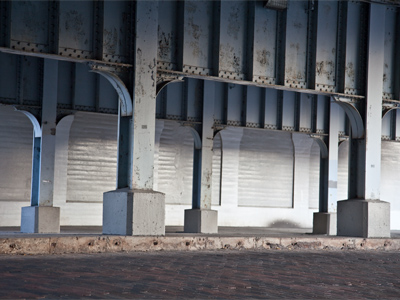 Built to last.  Massive freight trains constantly go by above.