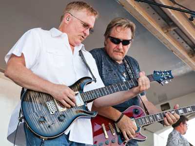 As soon as guitarists see someone with a camera at the edge of the stage, they suddenly get all Eddie van Halen.