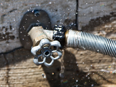  . . . but most of the water is puddling on the sidewalk.