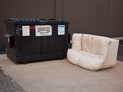 Today at work this couch caused trouble, so it was driven from our midst.  After spending the night out in the rain, somebody made off with it.  They`ll be sorry!