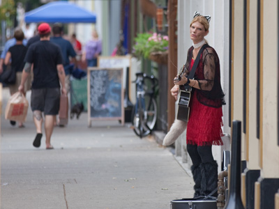 I`ve taken pictures of Oregon District street musicians before, but not one with cat ears, whiskers and a furry tail.