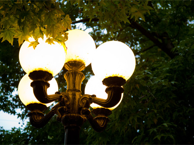 The streetlights in my neighborhood are old and probably very inefficient, and that`s part of their appeal.