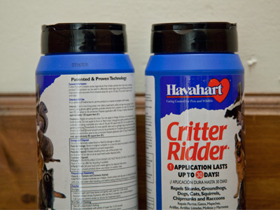 Cans of animal repellent showed up outside my doorway.  This is the time of year when raccoons move in upstairs.