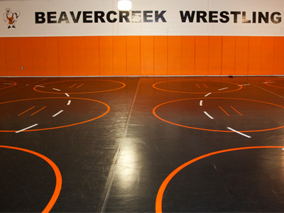 Scenes from a wrestling room.