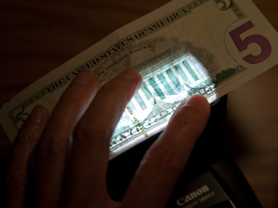 I`ve also taken enough closeups-of-money photos . . . but hey, what if I put the flash UNDERNEATH?