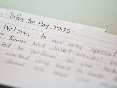 The emcee rehearses some remarks.