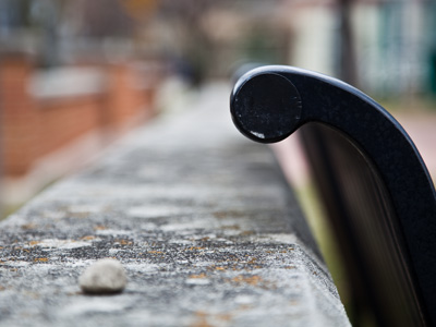 Park bench with stone.