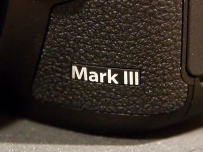 My new camera has three little marks.  Obviously superior.