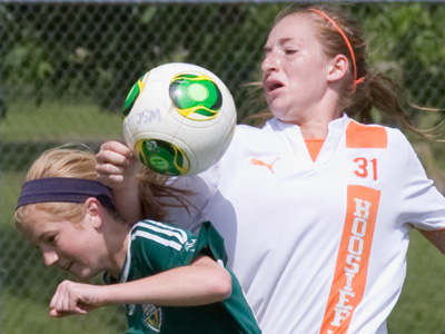 I generally prefer to photograph girls` sports rather than guys.  They may run into each other once in a while . . . 