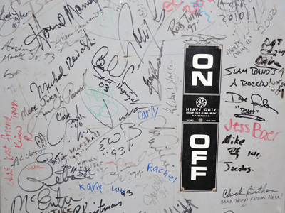 Behind the stage is a fuse box signed by Howie Mandel and Reba McIntire.  And me, if I can find a marker.