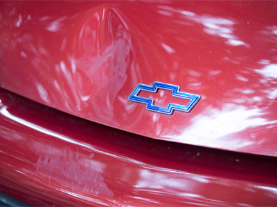 See the nice new dent in my car?  It makes it more aerodynamic.