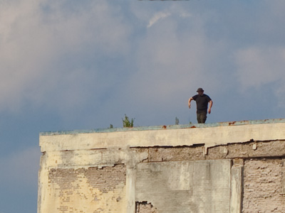 Guy on a building.