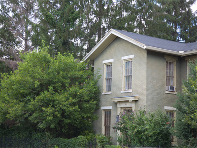 Nice try with the green paint, but I can still see the house.