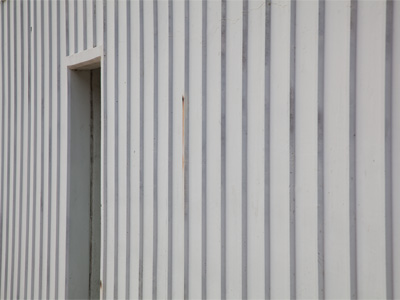 What this picture needs is a girl in a colorful dress leaning out of that doorway.