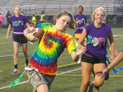 Guys use pads and helmets when they play football.  Wimps.