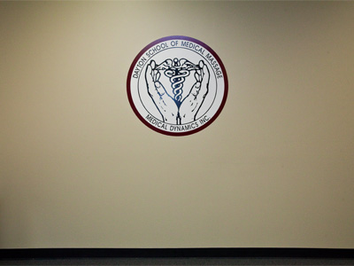 Waiting for a group of graduates to arrive . . . 