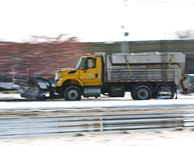 How does HE drive to work?