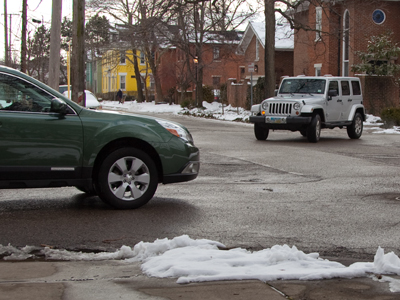 `Stop for me.`  `No, you stop for me.`