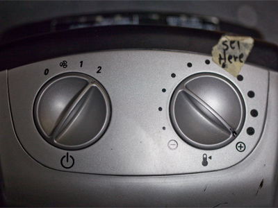 One of two space heaters in my office, set to full blast, ignoring someone else`s recommended setting.