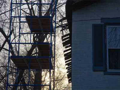 The endless roofing project across the street.