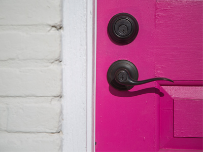 Behind the pink door is a photography studio.