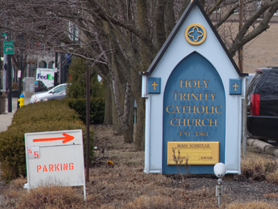 Crowds of people flocked to the Catholic church today -- because there is an Irish pub across the street.
