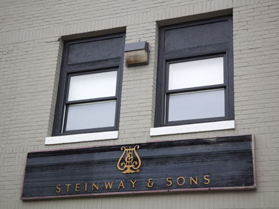 The piano store has moved out of this building.  I wonder what`s going to happen to the Steinway sign.