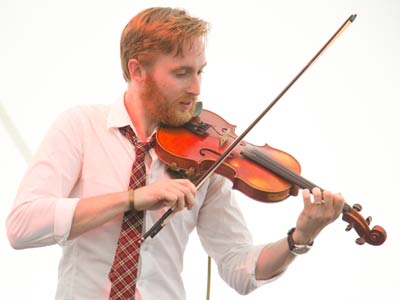 Hands around, hands around, trip it, and not too slow;  clear is the fiddle and sweet its sound, keep the girls` cheeks aglow. PAUL LAURENCE DUNBAR