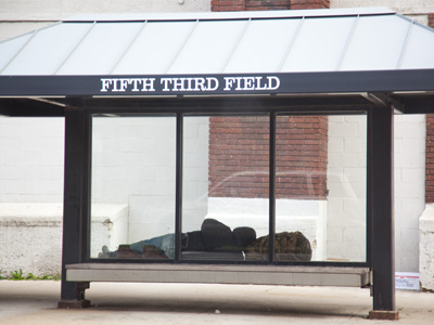 Waiting for the baseball game to start.