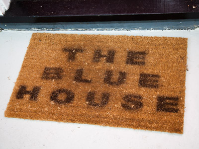 It`s a house, and it`s blue.  And there is art inside.