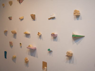 Ticky Tacky Houses (found materials) by Charmaine Renee.