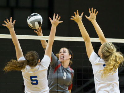 Don`t assume she`s trying to put the ball between the defender`s arms.  This action happens too fast for thought.