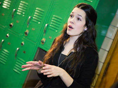 Warming up in the hallway before the show.