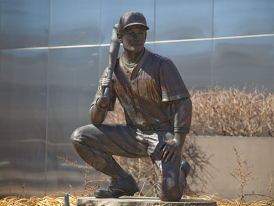 In the clearing kneels a player, and a pitcher by his trade.