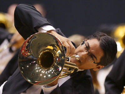 I can see a reflection of myself sitting in the front row.