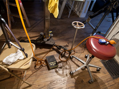 The unabridged volume of Shakespeare on the floor was actually necessary to help adjust the enormous camera.