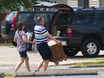 As soon as graduation is over, mom and dad get to work.