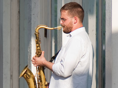 A new face, but an old horn, appears on East Fifth Street.