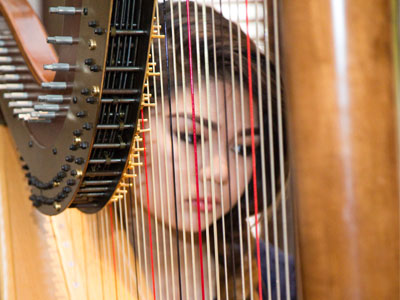 It`s challenging to photograph a harpist.